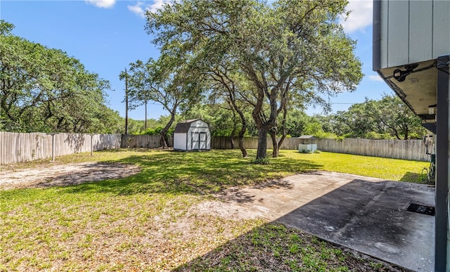 102 Mallard Dr, Aransas Pass, TX 78336 - view of yard featuring a storage shed, a patio, and an outbuilding