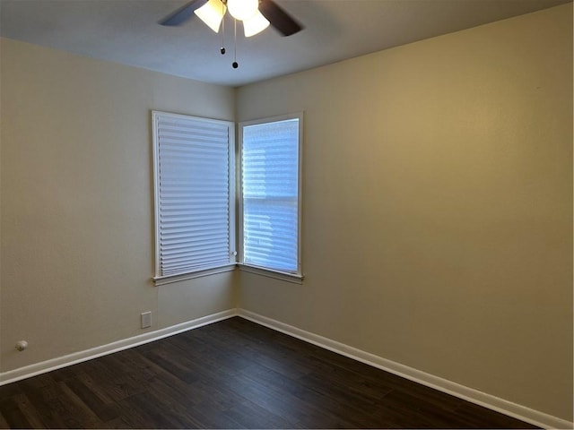 4822 Dodd Dr, Corpus Christi, TX 78415 - spare room featuring ceiling fan, dark wood-type flooring, and baseboards