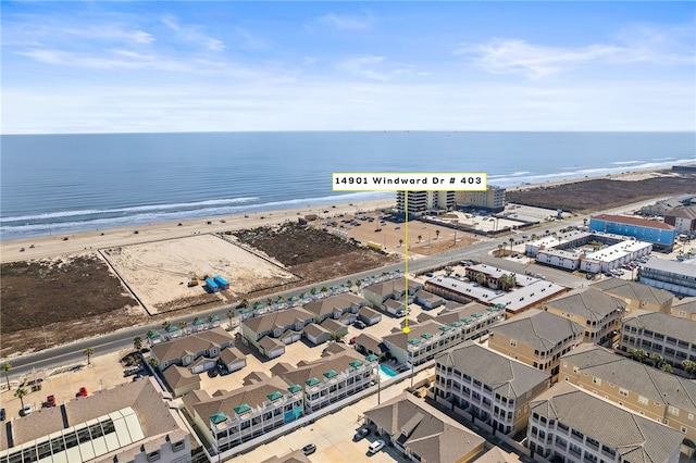 aerial view with a view of the beach and a water view