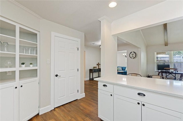 1010 Weber Pkwy, Corpus Christi, TX 78411 - kitchen featuring wood finished floors, light countertops, and white cabinets