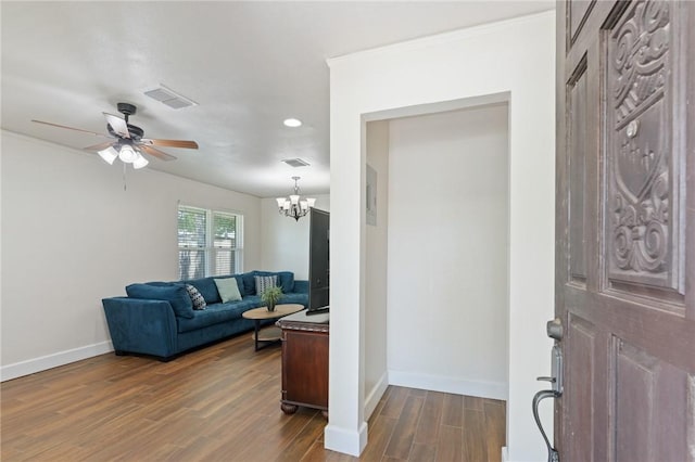 1010 Weber Pkwy, Corpus Christi, TX 78411 - living area with dark wood-style floors, a ceiling fan, a chandelier, and recessed lighting