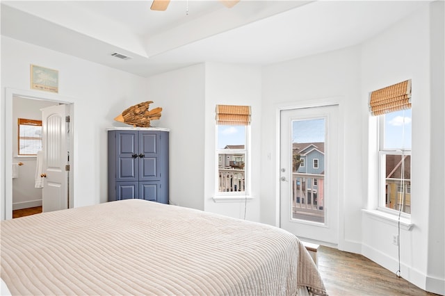 bedroom featuring hardwood / wood-style flooring and ceiling fan