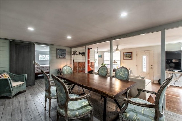 dining space with ceiling fan, wood finished floors, and recessed lighting