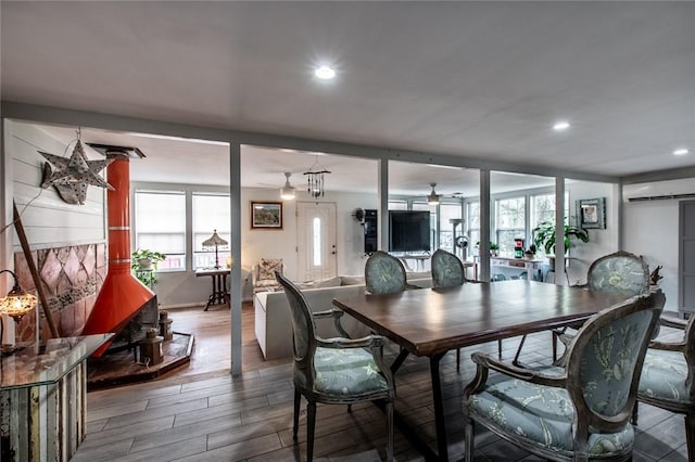 dining area with ceiling fan, plenty of natural light, wood finished floors, and recessed lighting