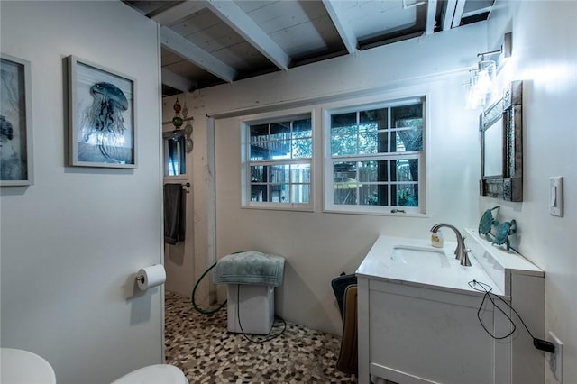 bathroom with lofted ceiling with beams, wood ceiling, vanity, and toilet