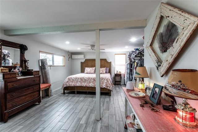 bedroom with recessed lighting, beamed ceiling, a wall mounted air conditioner, and wood tiled floor