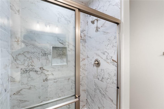 bathroom featuring walk in shower