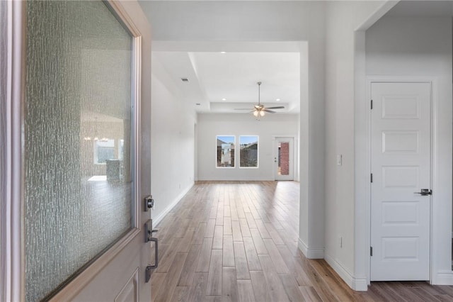 hallway with light wood-type flooring