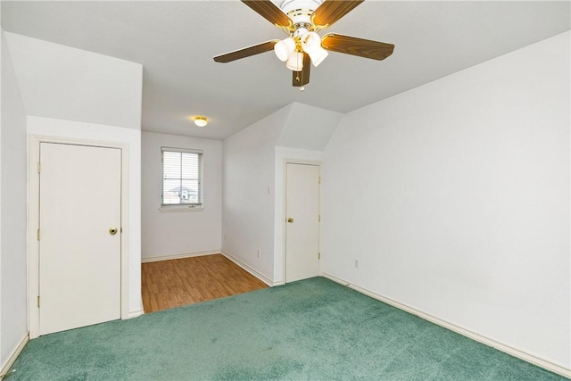 interior space featuring a ceiling fan and baseboards