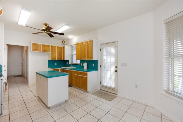 8101 Mt Zion, Corpus Christi, TX 78413 - kitchen featuring a center island, ceiling fan, and light tile patterned floors