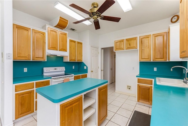 kitchen with visible vents, light tile patterned flooring, a sink, and white range with electric stovetop