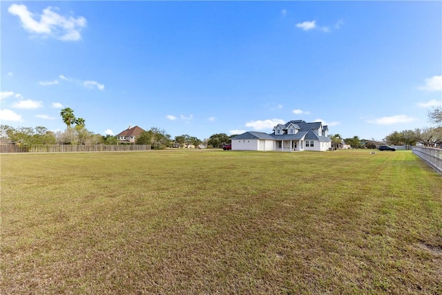 view of yard with fence