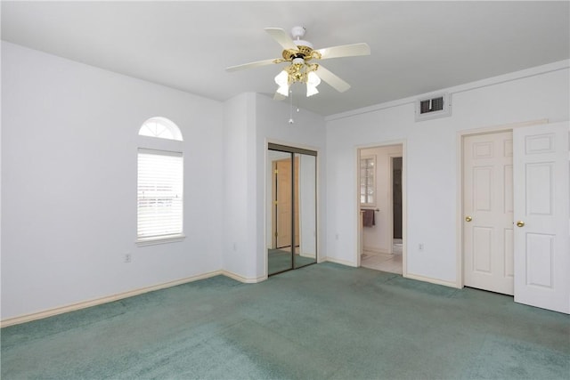 8101 Mt Zion, Corpus Christi, TX 78413 - unfurnished bedroom with carpet flooring, connected bathroom, and a ceiling fan