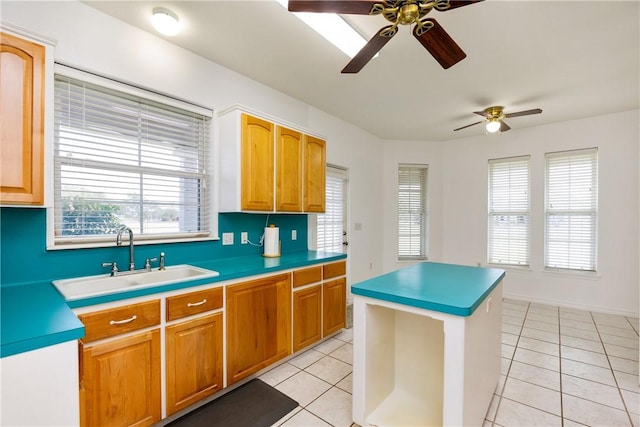 8101 Mt Zion, Corpus Christi, TX 78413 - kitchen with a ceiling fan, light tile patterned flooring, a center island, and decorative backsplash