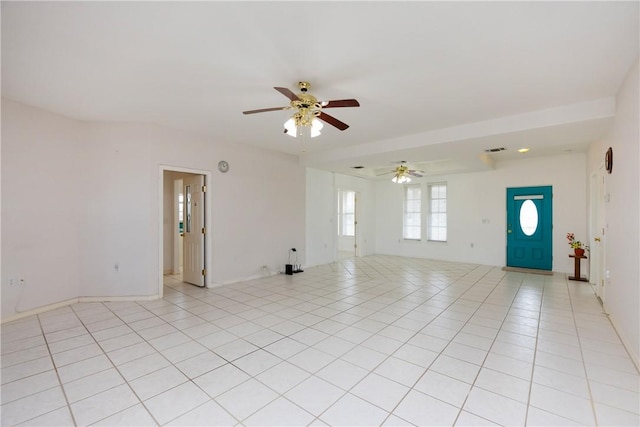 empty room featuring light tile patterned floors, ceiling fan, and visible vents