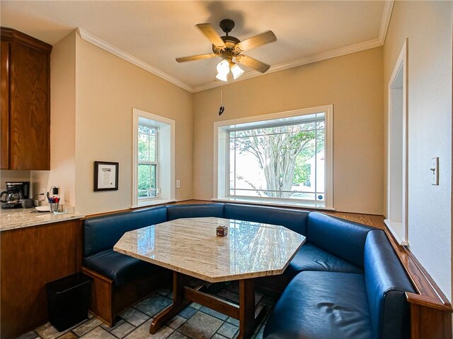 460 Del Mar Blvd, Corpus Christi, TX 78404 - dining area featuring ornamental molding, ceiling fan, and breakfast area
