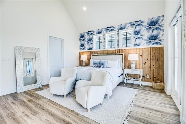 206 Lakeshore St, Port Aransas, TX 78373 - bedroom featuring high vaulted ceiling, wood finished floors, baseboards, and recessed lighting