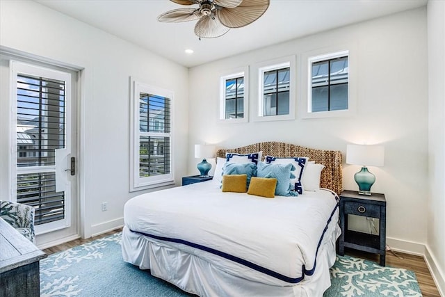 206 Lakeshore St, Port Aransas, TX 78373 - bedroom featuring baseboards, wood finished floors, recessed lighting, and a ceiling fan
