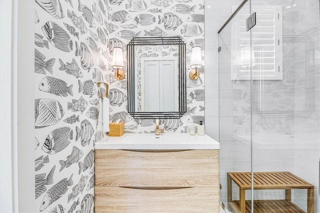 206 Lakeshore St, Port Aransas, TX 78373 - bathroom with a shower stall, vanity, and wallpapered walls