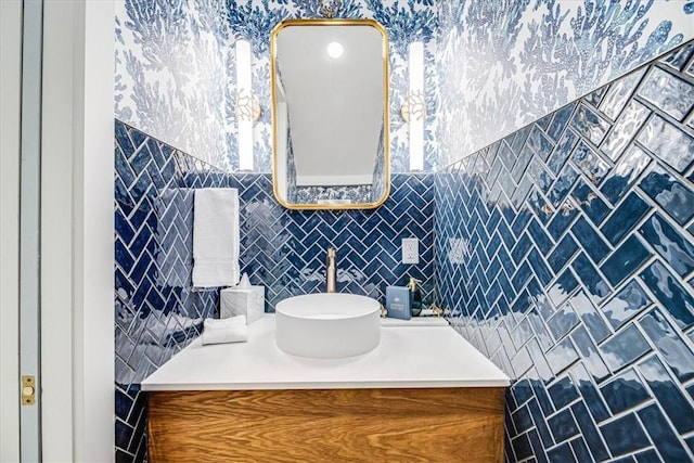206 Lakeshore St, Port Aransas, TX 78373 - bathroom featuring vanity and tasteful backsplash