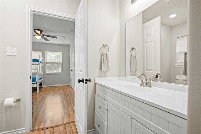 bathroom with vanity and wood-type flooring