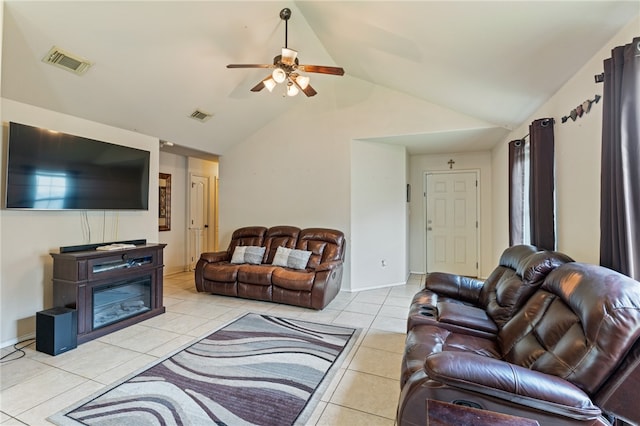 living room with light tile patterned floors, ceiling fan, and lofted ceiling