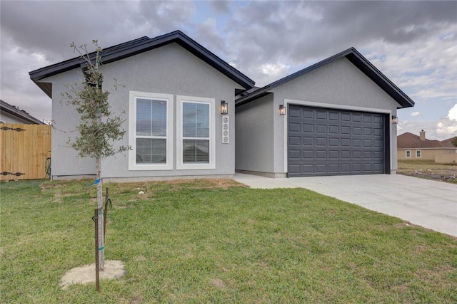 ranch-style home featuring a garage and a front lawn