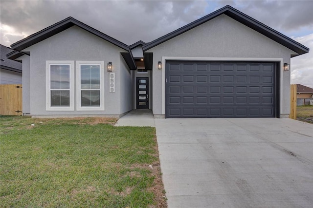 ranch-style house with a front lawn and a garage