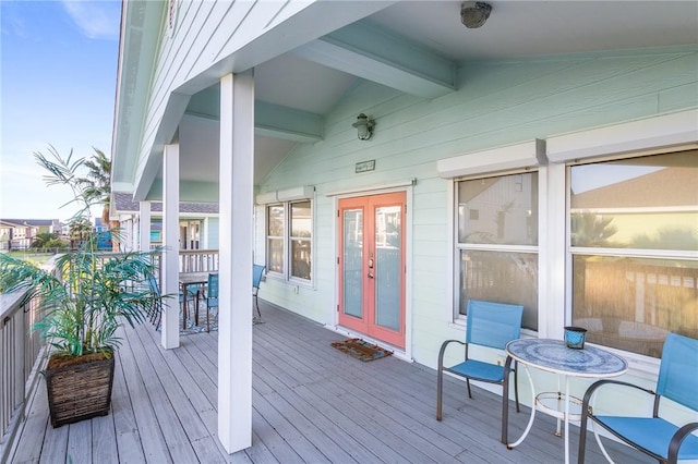1224 S Live Oak St, Rockport, TX 78382 - wooden terrace with french doors