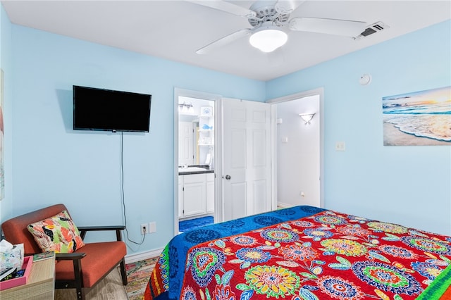 bedroom with connected bathroom and ceiling fan