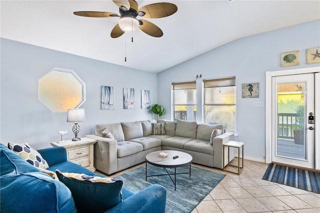 1224 S Live Oak St, Rockport, TX 78382 - living room featuring vaulted ceiling, a ceiling fan, light tile patterned floors, and baseboards