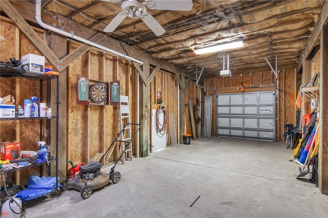 garage with ceiling fan and a garage door opener