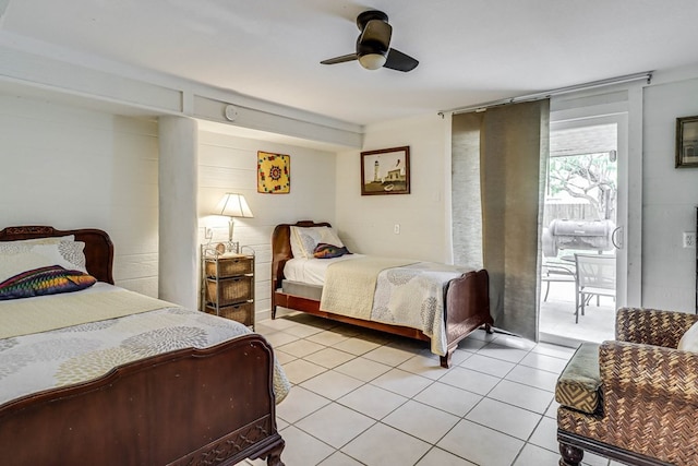 bedroom featuring light tile patterned floors and ceiling fan