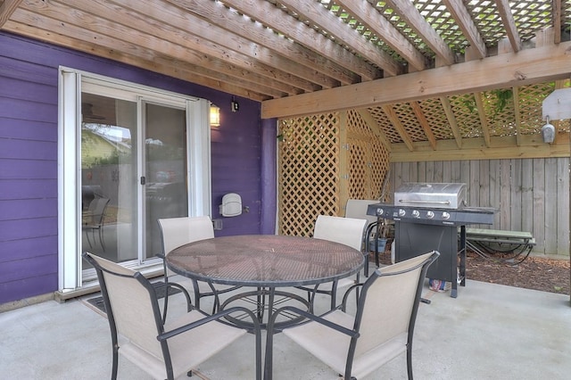 view of patio / terrace with a pergola and area for grilling