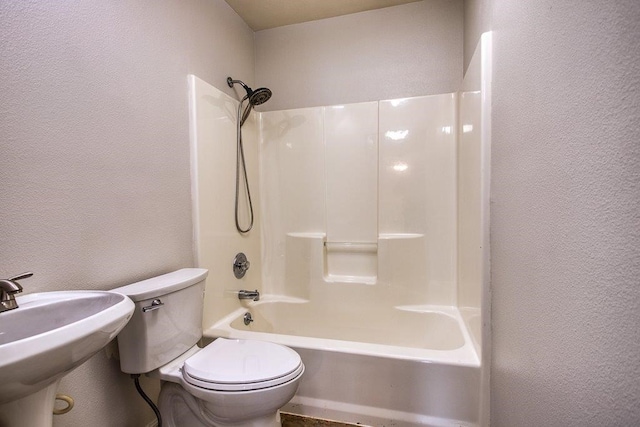 full bathroom featuring shower / washtub combination, sink, and toilet