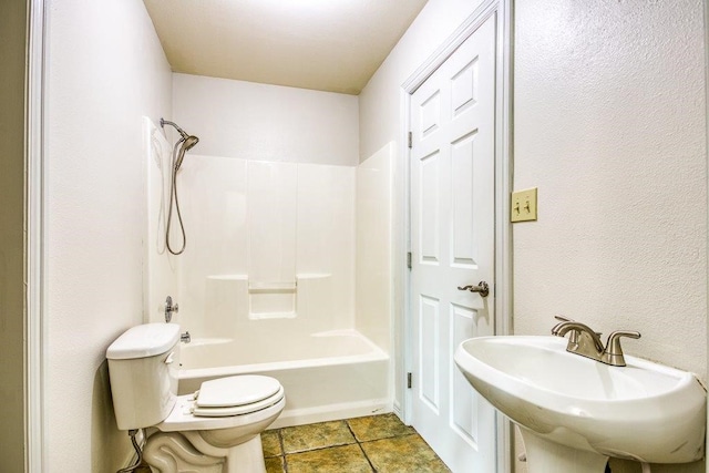 full bathroom featuring sink, toilet, and shower / bath combination