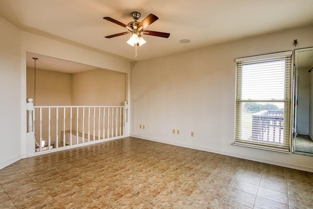 spare room featuring ceiling fan