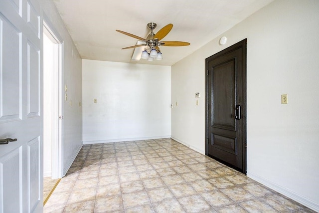 spare room with ceiling fan