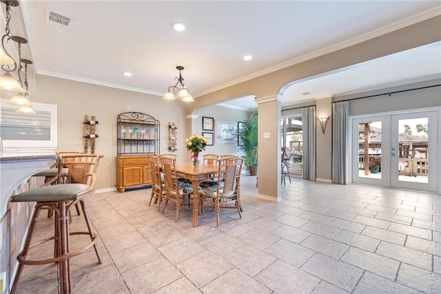 dining space featuring baseboards, visible vents, ornamental molding, ornate columns, and recessed lighting