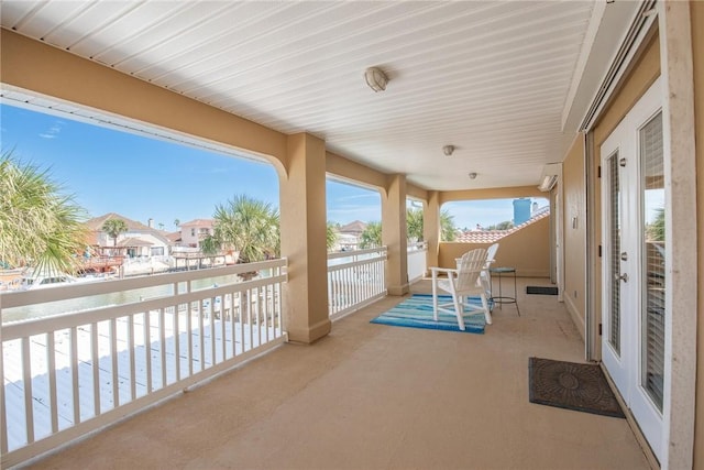 exterior space featuring a residential view and a balcony