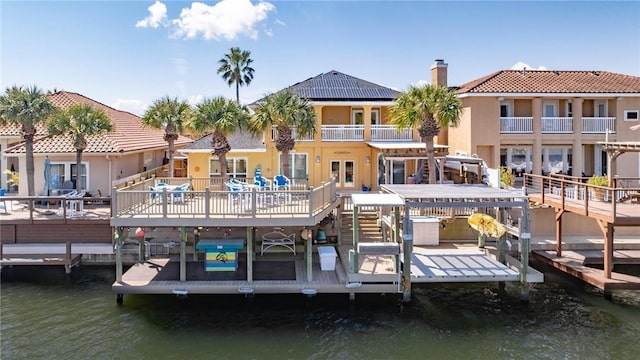 view of dock featuring a water view and boat lift