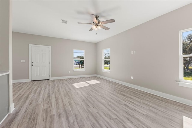 unfurnished room with ceiling fan and light hardwood / wood-style flooring