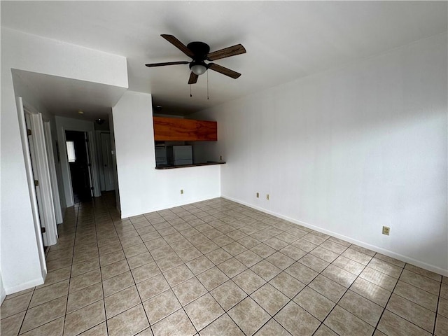 13958 Fortuna Bay Dr Unit C, Corpus Christi, TX 78418 - unfurnished living room featuring ceiling fan and light tile patterned flooring