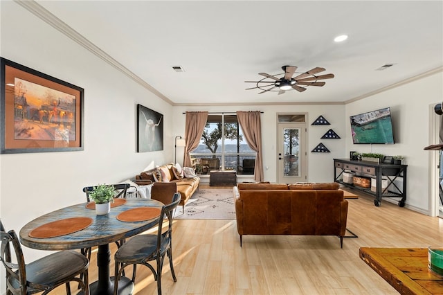 1044 Edinburgh Dr Unit 1044, Kerrville, TX 78028 - living area featuring light wood-type flooring, visible vents, a ceiling fan, and crown molding