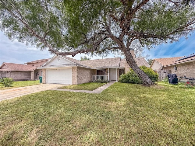 6918 Roseland Dr, Corpus Christi, TX 78414 - view of front of house featuring an attached garage, a front yard, and concrete driveway