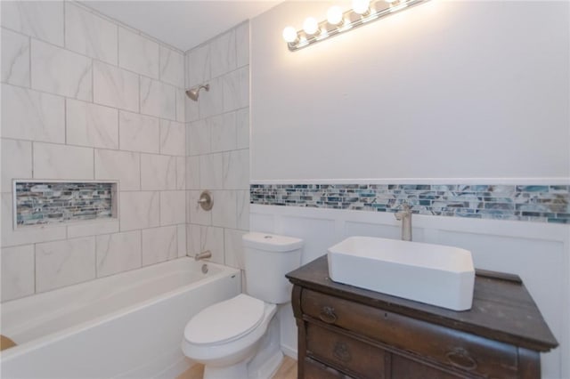 6918 Roseland Dr, Corpus Christi, TX 78414 - full bathroom with shower / washtub combination, vanity, and tile walls