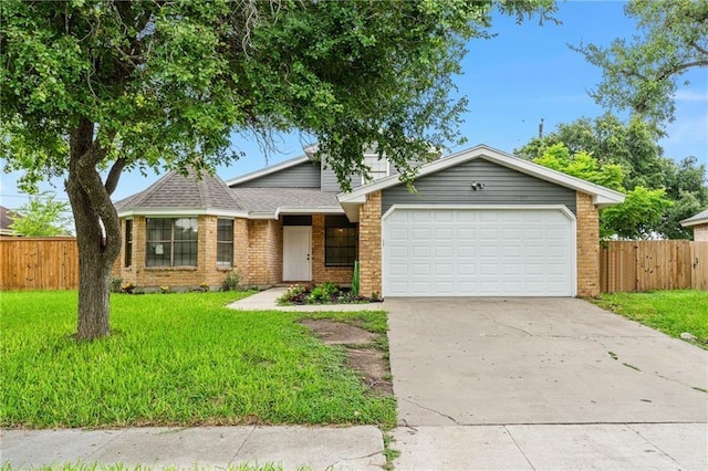 ranch-style house featuring a garage and a front yard