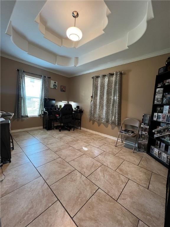 interior space featuring ornamental molding and a tray ceiling