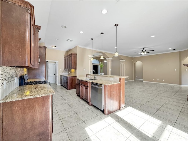 kitchen featuring ceiling fan, sink, tasteful backsplash, stainless steel dishwasher, and pendant lighting