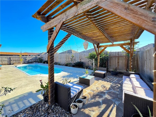 view of pool with a pergola and a patio